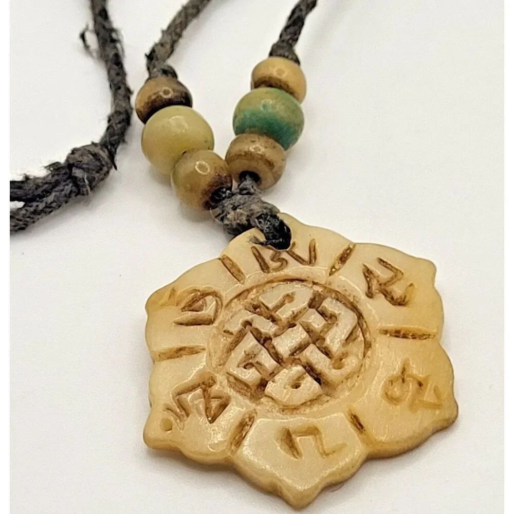 Carved Bohemian Horn Bovine Pendant Cord 23in